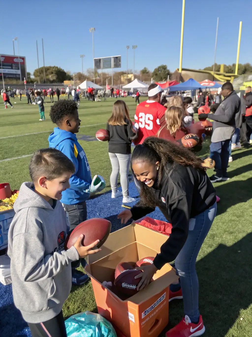 An image of volunteers assisting at a community sports event, highlighting the collaborative spirit and community involvement fostered by INSPIRATION SPORTIVE.